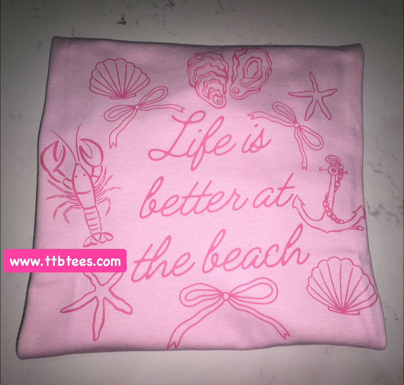 Life is better at the beach- pink writing