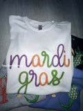 Faux tinsel Mardi Gras